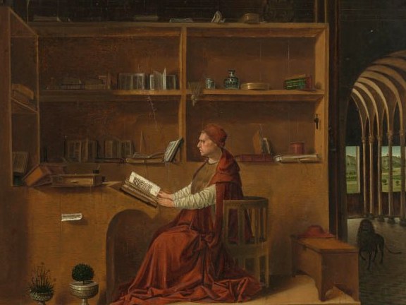 Humanista leyendo en un estudio con libros